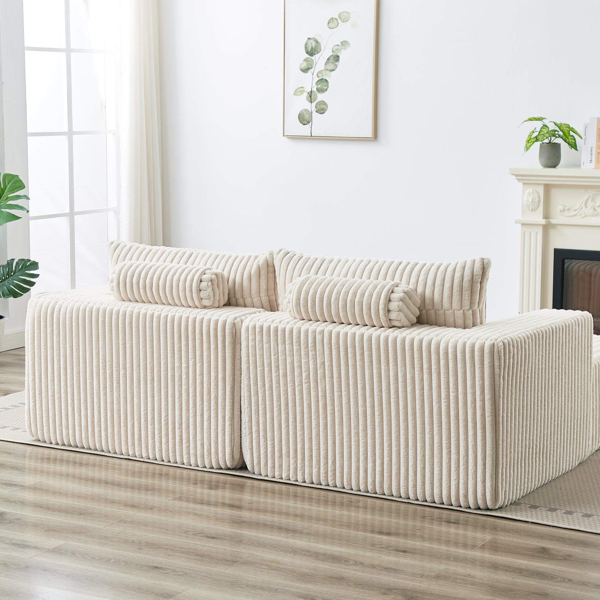 Plush cream corduroy sectional sofa with matching bolster pillows for modern living rooms