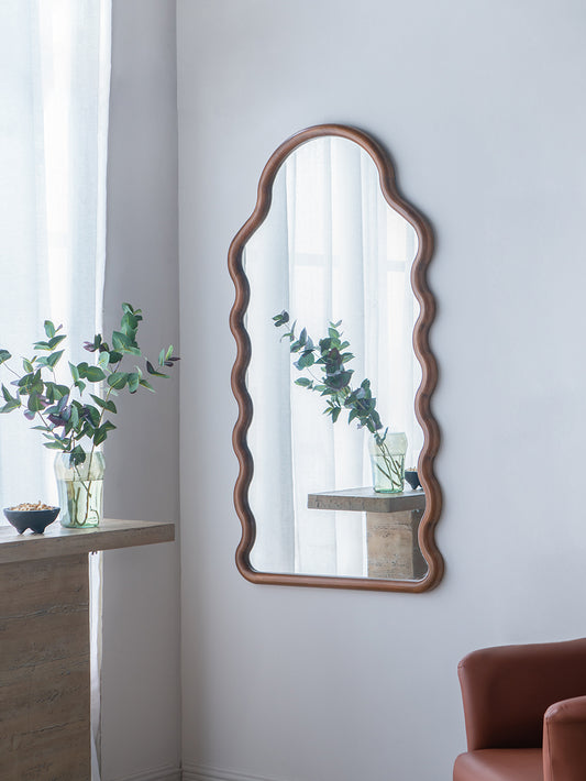 Scalloped edge wood mirror with brass finish ideal for entryway decor