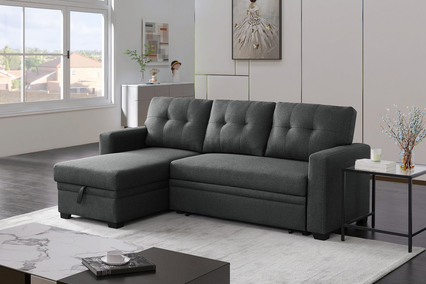 Dark gray fabric sectional sofa with tufted cushions and chaise for living room comfort