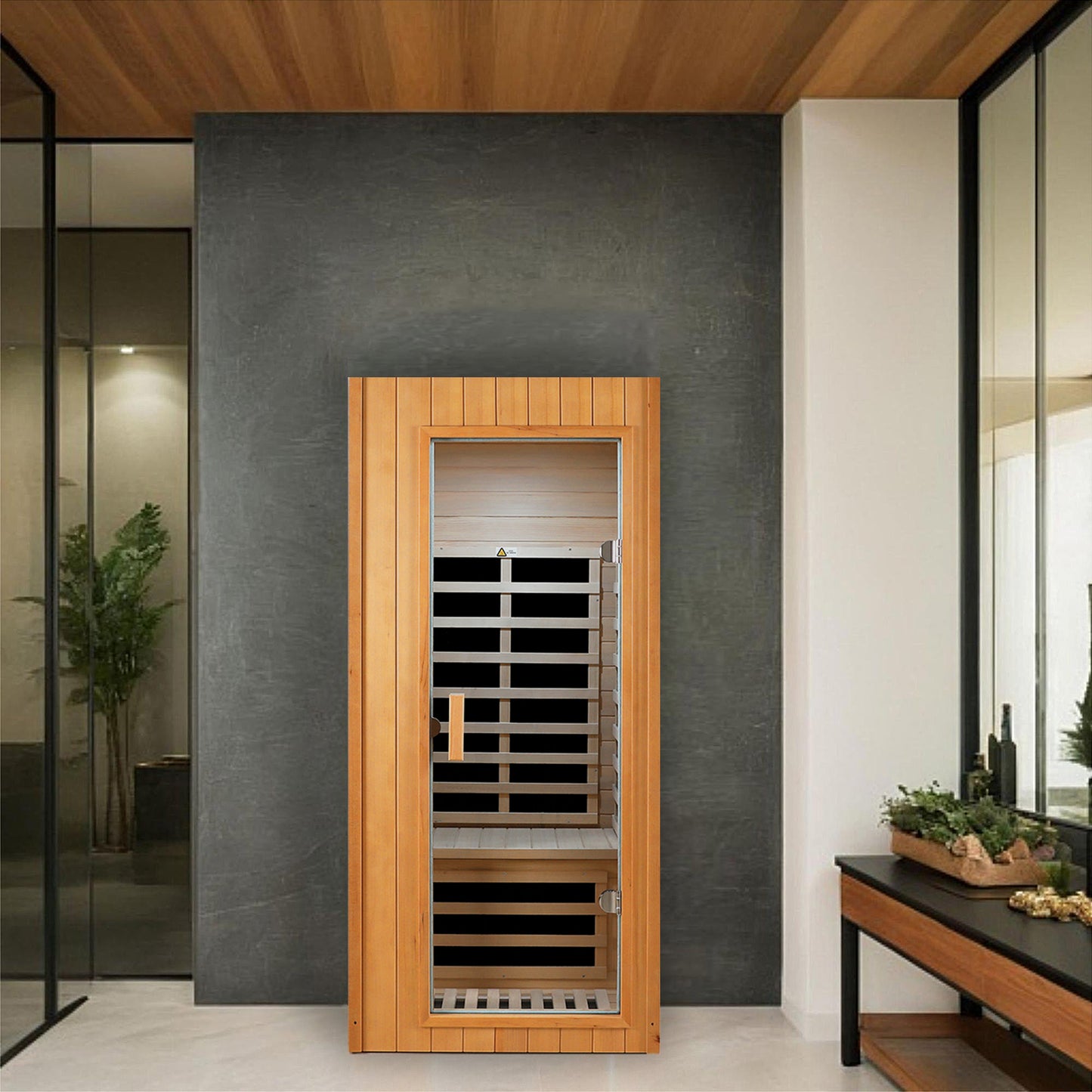 Compact cedar infrared sauna with glass door and wooden interior benches
