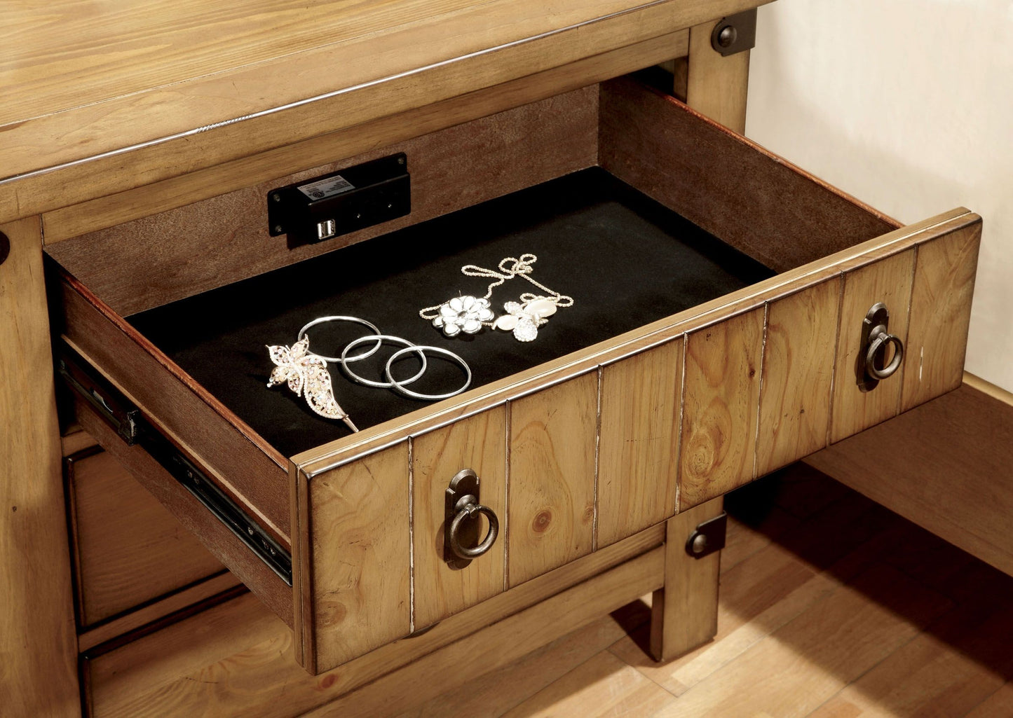 Rustic pine wood nightstand drawer with jewelry