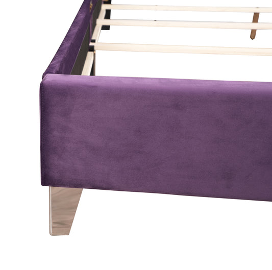 Closeup of a plush purple velvet bed frame with polished metal legs ready for mattress support