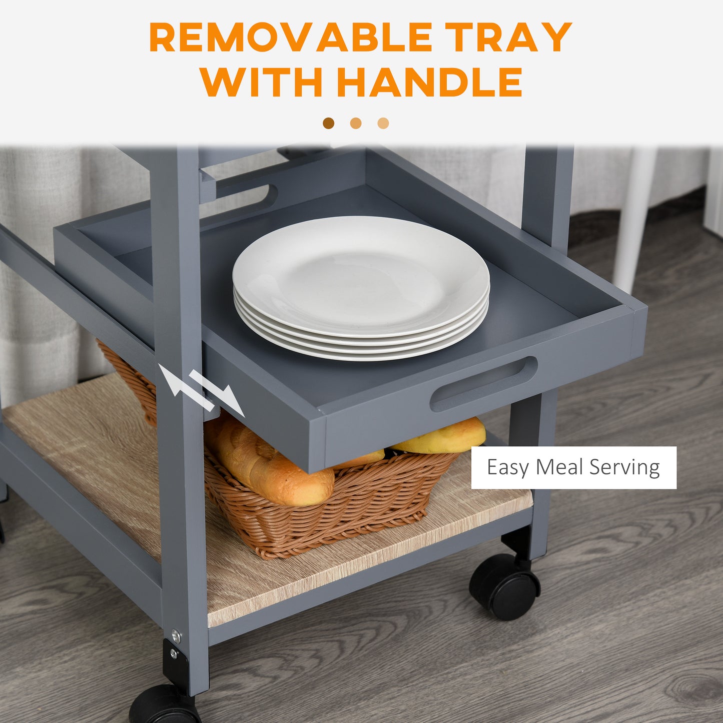 Grey serving cart with removable tray and handle holding white plates