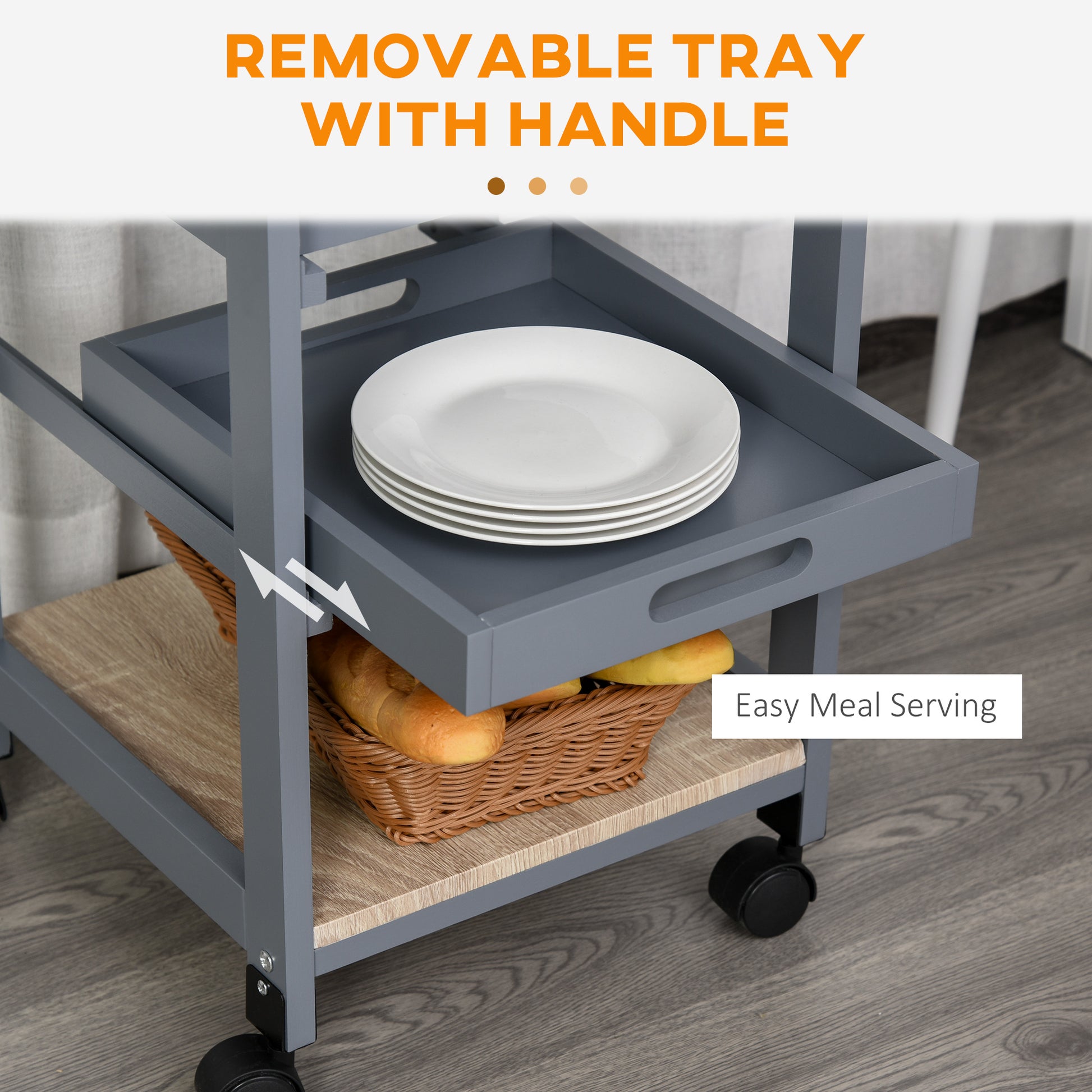 Grey serving cart with removable tray and handle holding white plates