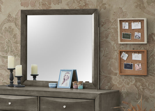 Gray wood dresser with large mirror and decorative frame