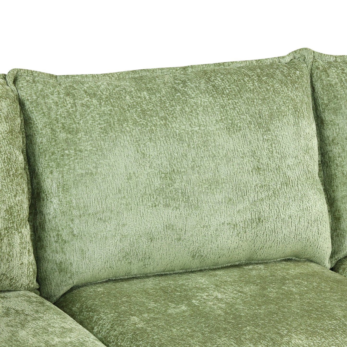 Closeup of a plush green velvet sofa cushion perfect for modern living rooms