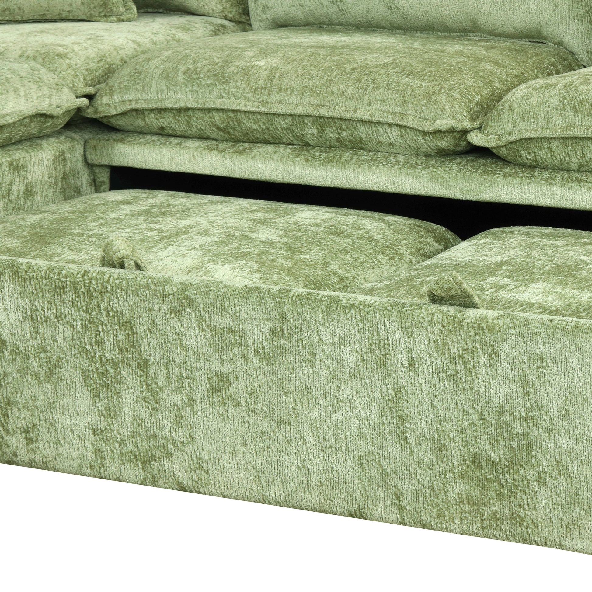 Sage green velvet sectional sofa with plush textured cushions and armrest