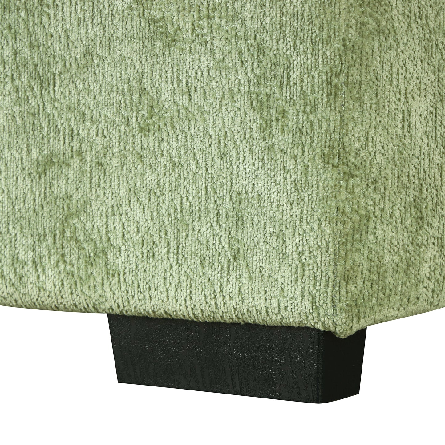 Light green chenille fabric swatch with visible texture and a dark wood block foot