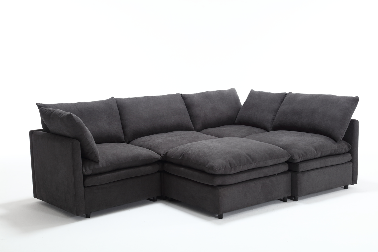 Dark gray sectional sofa with plush cushions and modular design