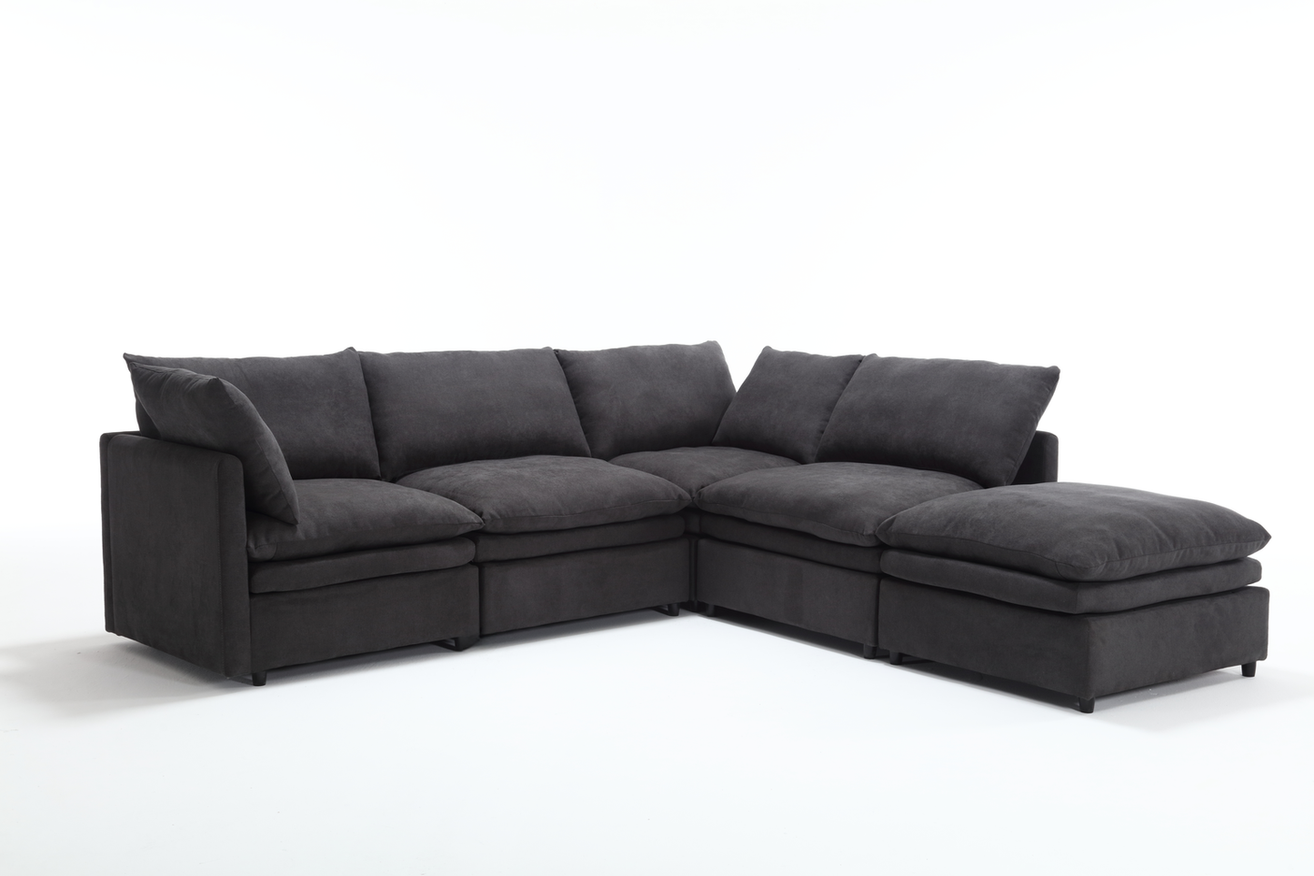 Dark gray fabric sectional sofa with plush cushions for a modern living room