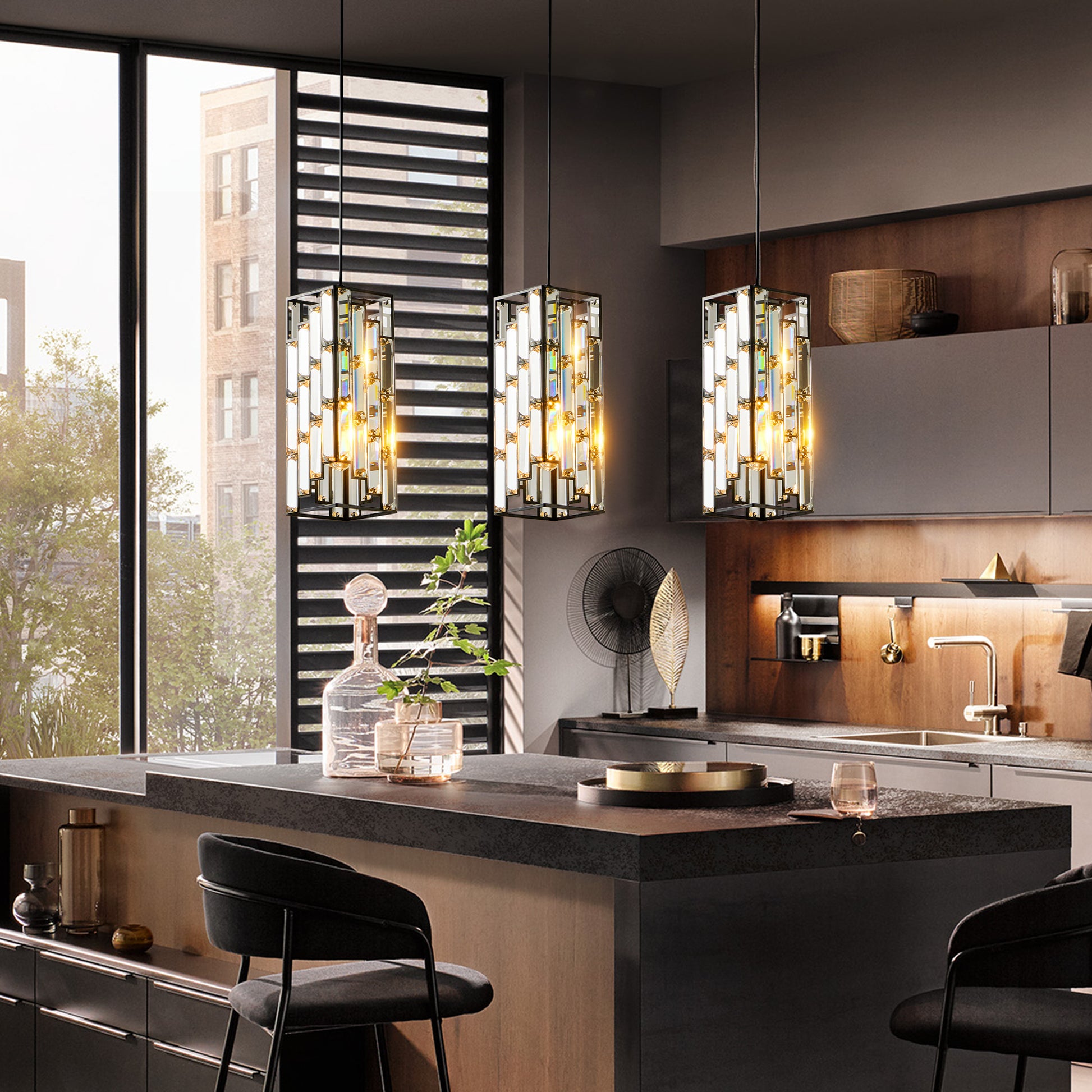 Modern rectangular pendant light with clear crystal accents and brass hardware ideal for kitchen island lighting
