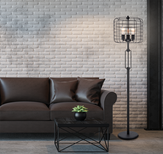Black industrial floor lamp with caged shade and exposed bulbs
