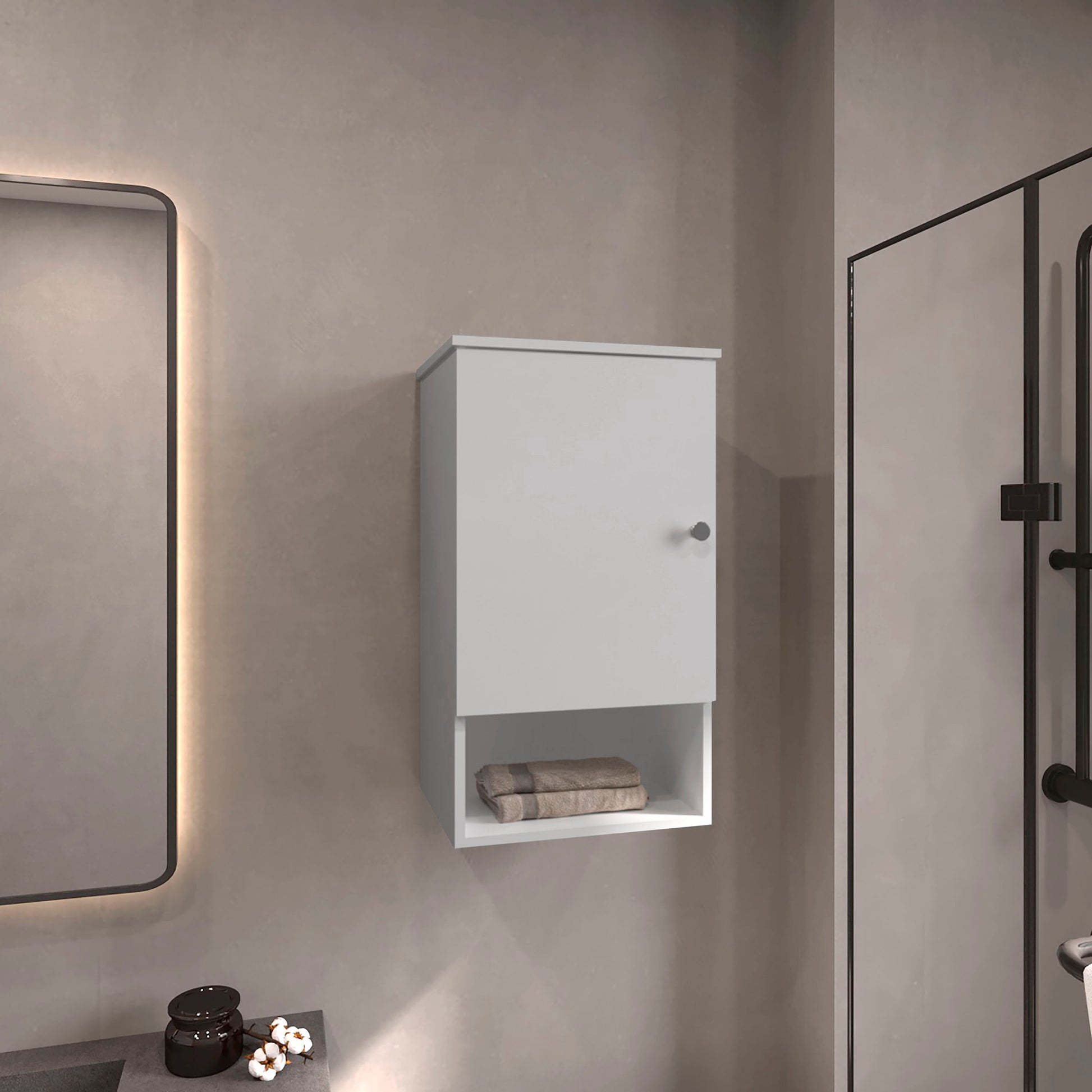 White wallmounted bathroom cabinet with open shelf holding two folded towels
