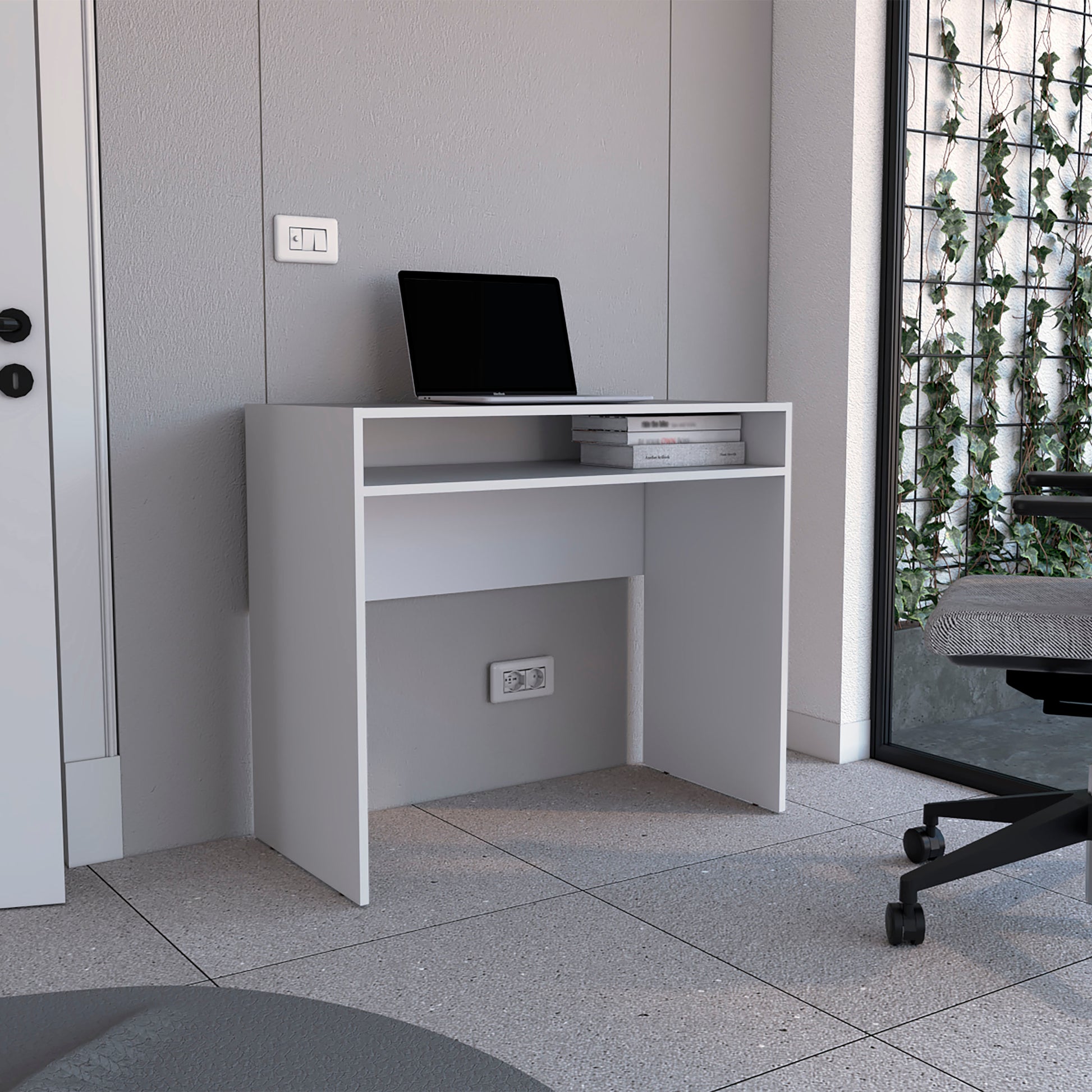 Minimalist white desk with open shelving laptop and books