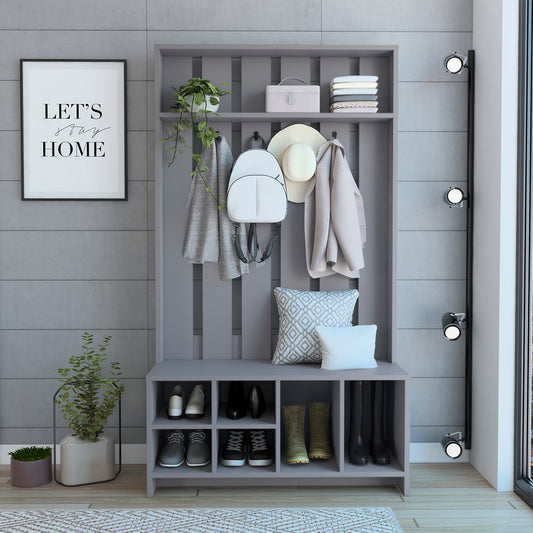 Gray entryway hall tree with shoe storage coat hooks hat shelf and decorative pillows