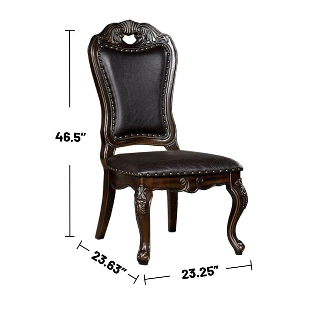 Ornate dark brown leather dining chair with carved wooden frame and antique nailhead trim