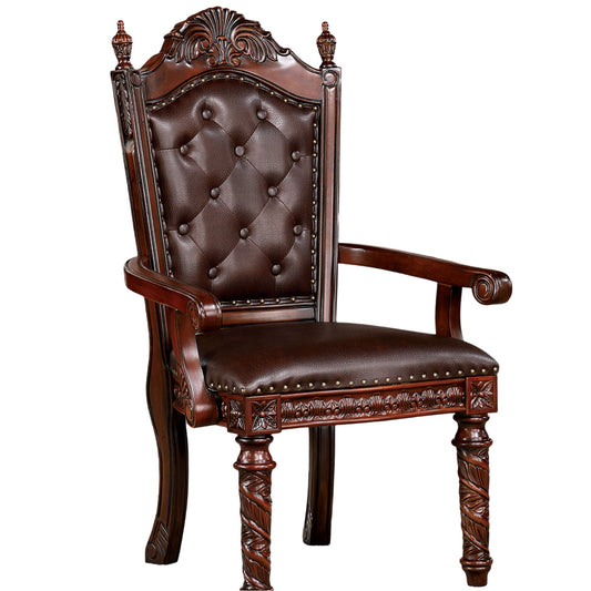 Ornate wooden armchair with tufted brown leather seat and back featuring carved details