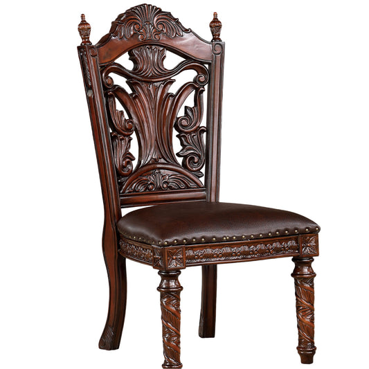 Ornate carved mahogany dining chair with dark brown leather seat and brass tacks