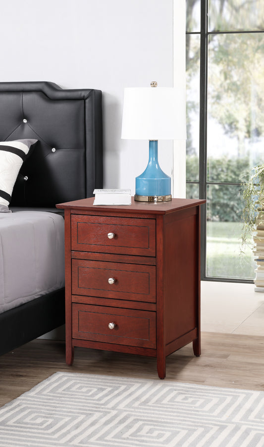 Mahogany wood bedside table with three drawers and silver knobs beside a bed