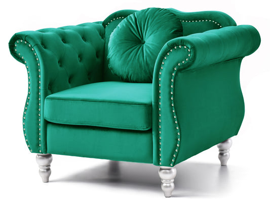 Emerald green velvet armchair with tufted back silver stud accents and round accent pillow