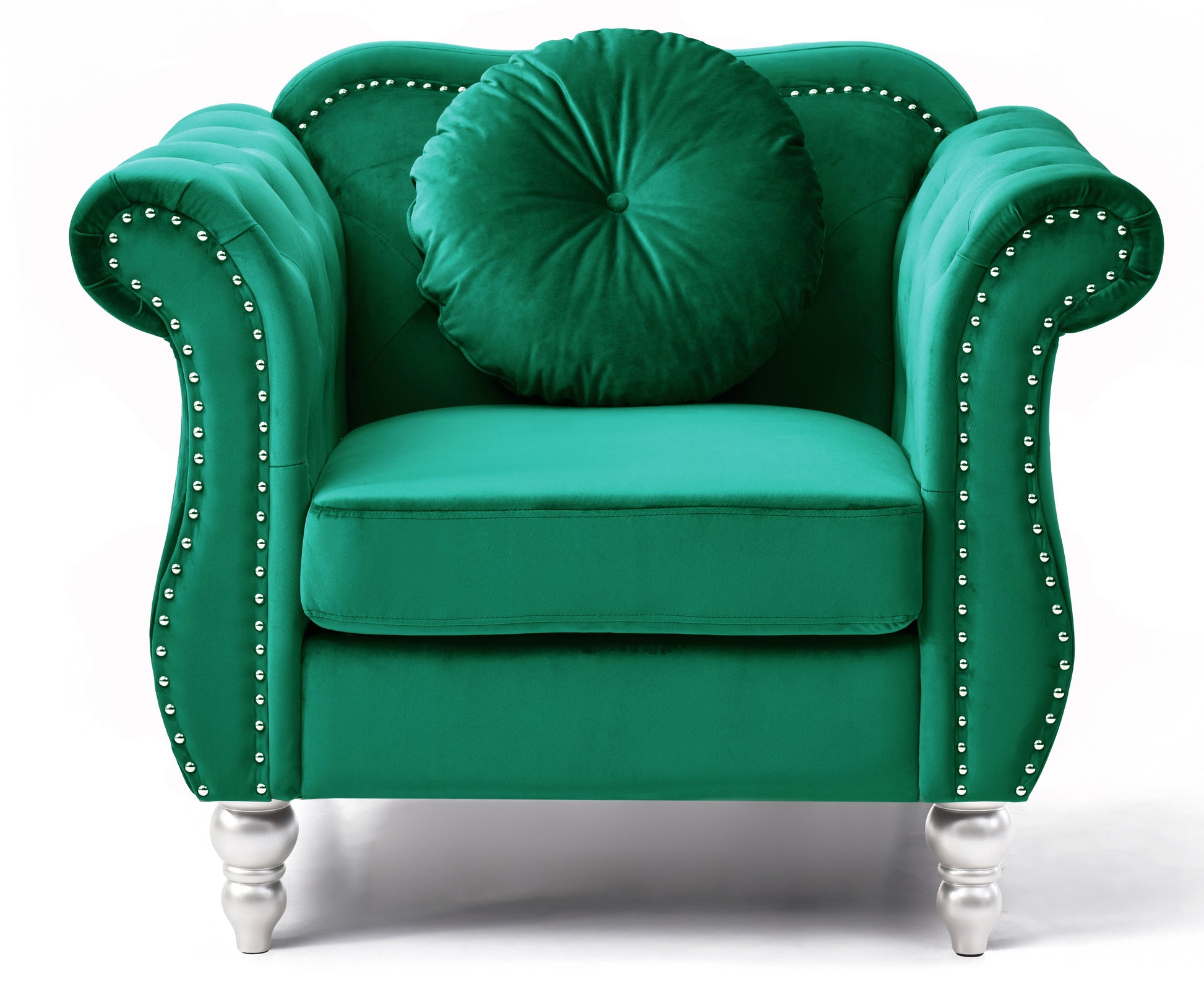 Emerald green velvet armchair with silver nailhead trim and round pillow