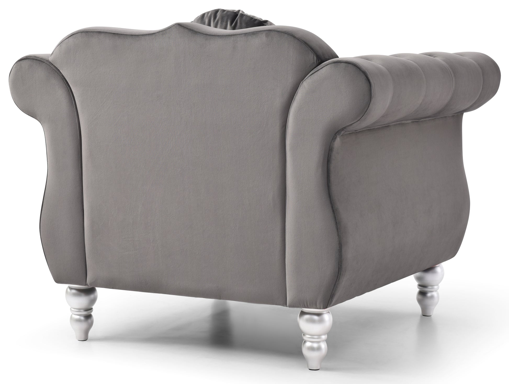 Gray velvet armchair with button tufting and silver legs