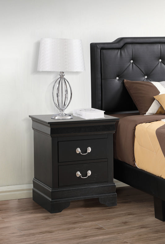 Black wood nightstand with two drawers ornate silver pulls next to a bed