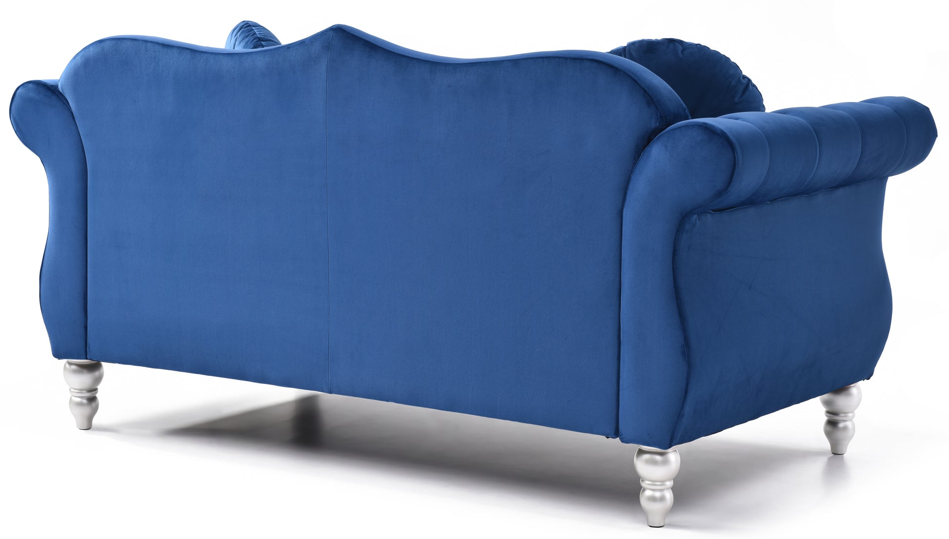 Deep blue velvet sofa with tufted back elegant scrolled arms and silver legs