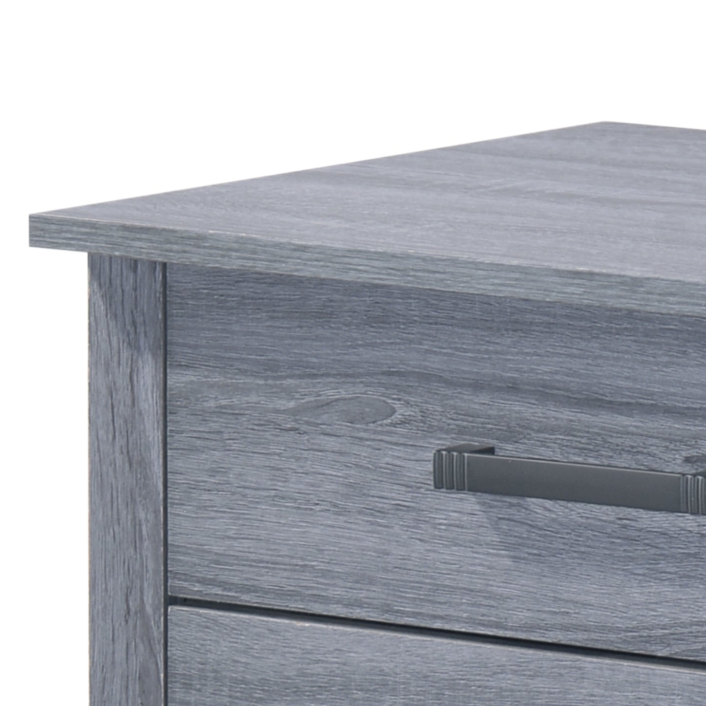 Closeup of a gray distressed wood dresser with a dark metal handle