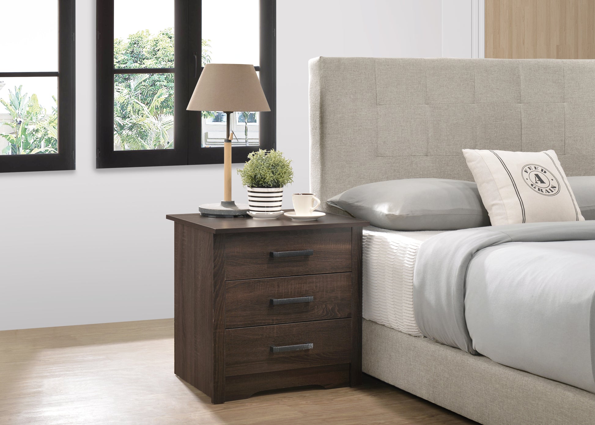 Dark brown wooden nightstand with three drawers and black handles