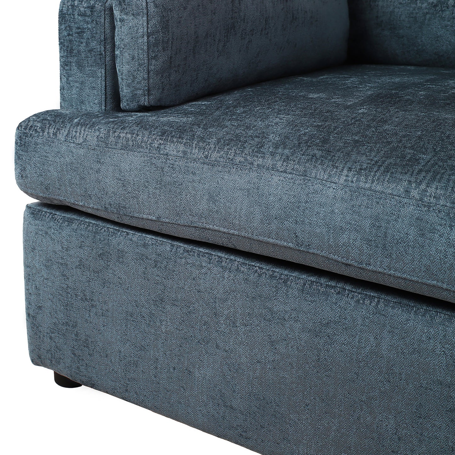 Closeup of dark teal chenille fabric sofa detail with textured weave showing stitching