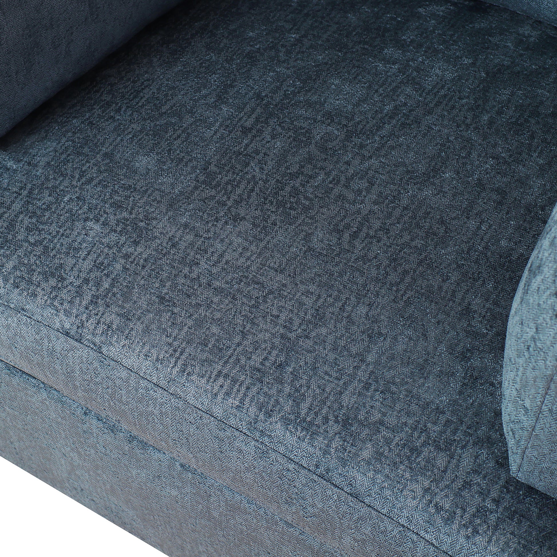 Closeup of dark blue woven fabric with a subtle herringbone pattern perfect for upholstery