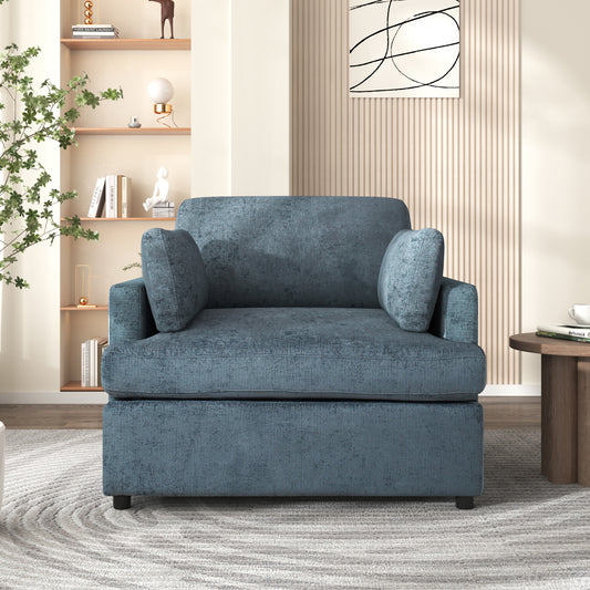 Plush blue velvet armchair with deep seating and overstuffed arms perfect for a cozy living room