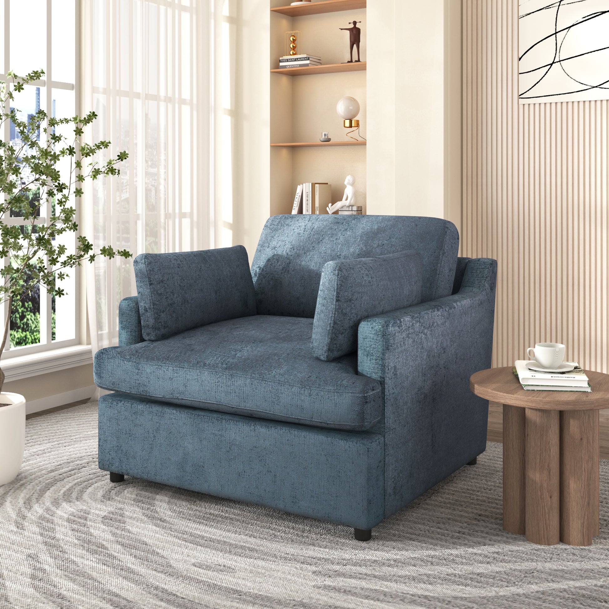 Deep teal textured fabric armchair with plush cushions and modern design