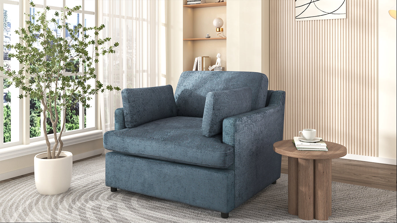 Deep teal textured fabric armchair with plush cushions perfect for a cozy reading nook
