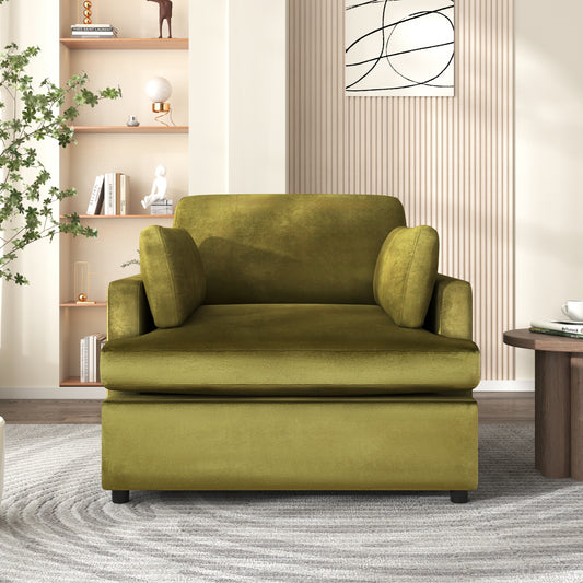 Plush olive green velvet armchair with deep seating and thick armrests