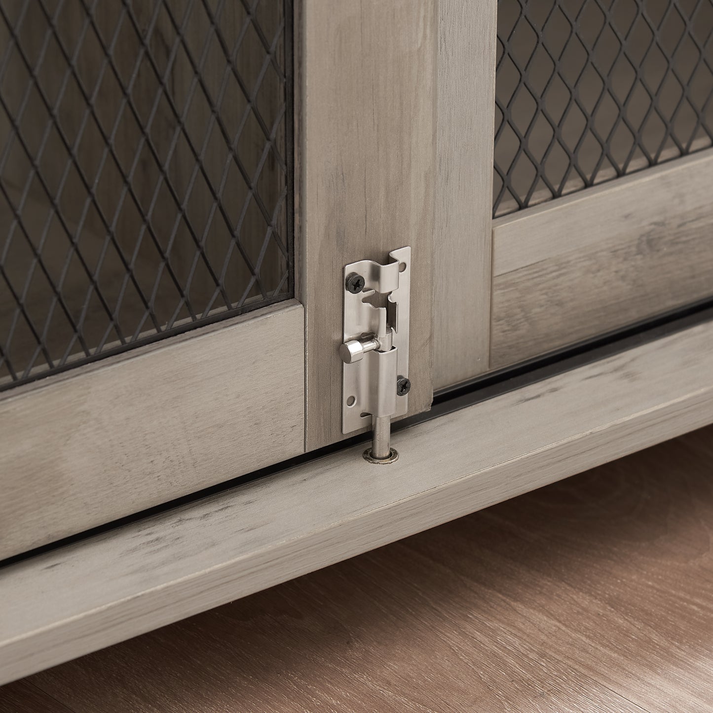 Weathered oak cabinet door with diamond mesh inset and silver latch