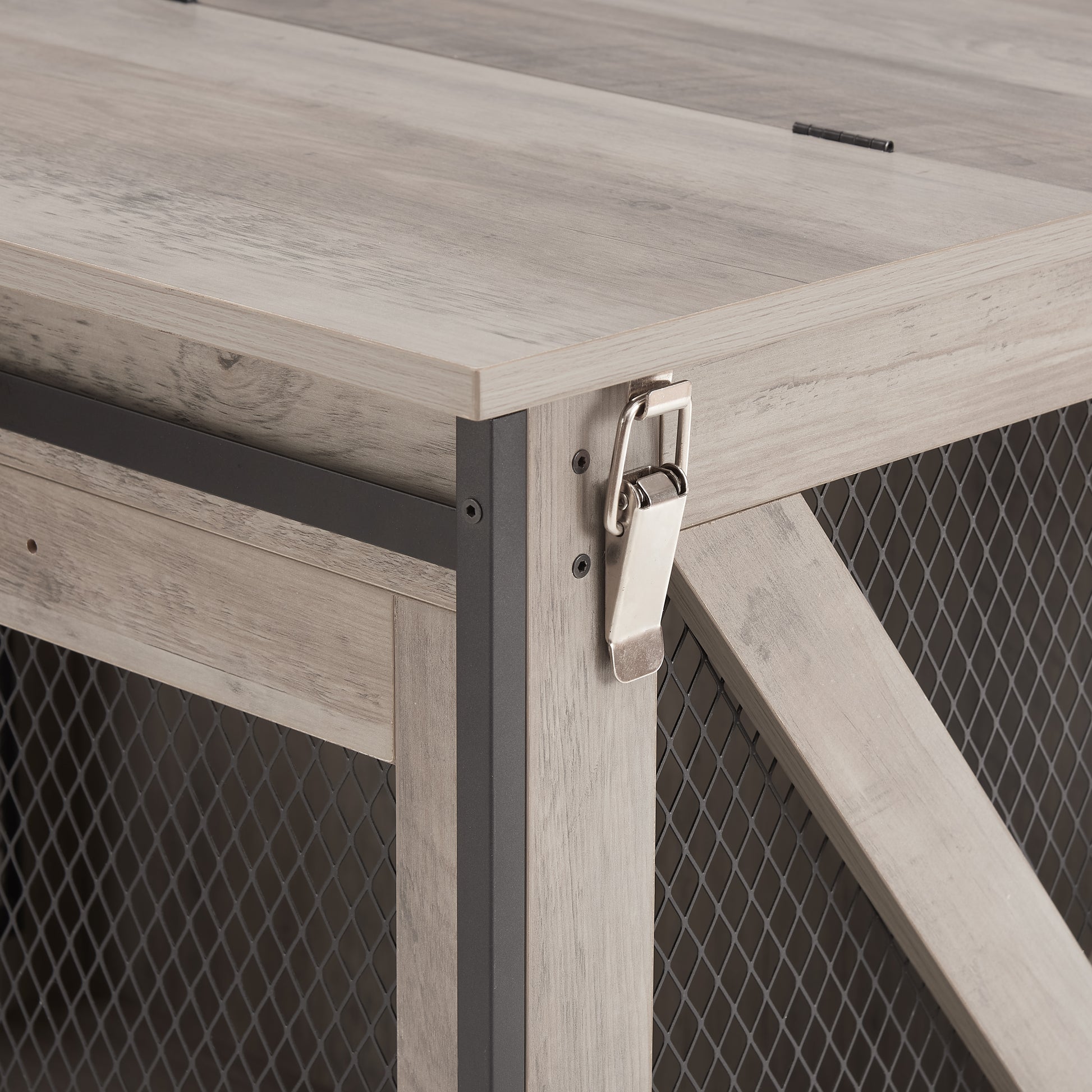 Rustic wooden cabinet with metal latch and mesh panel detail