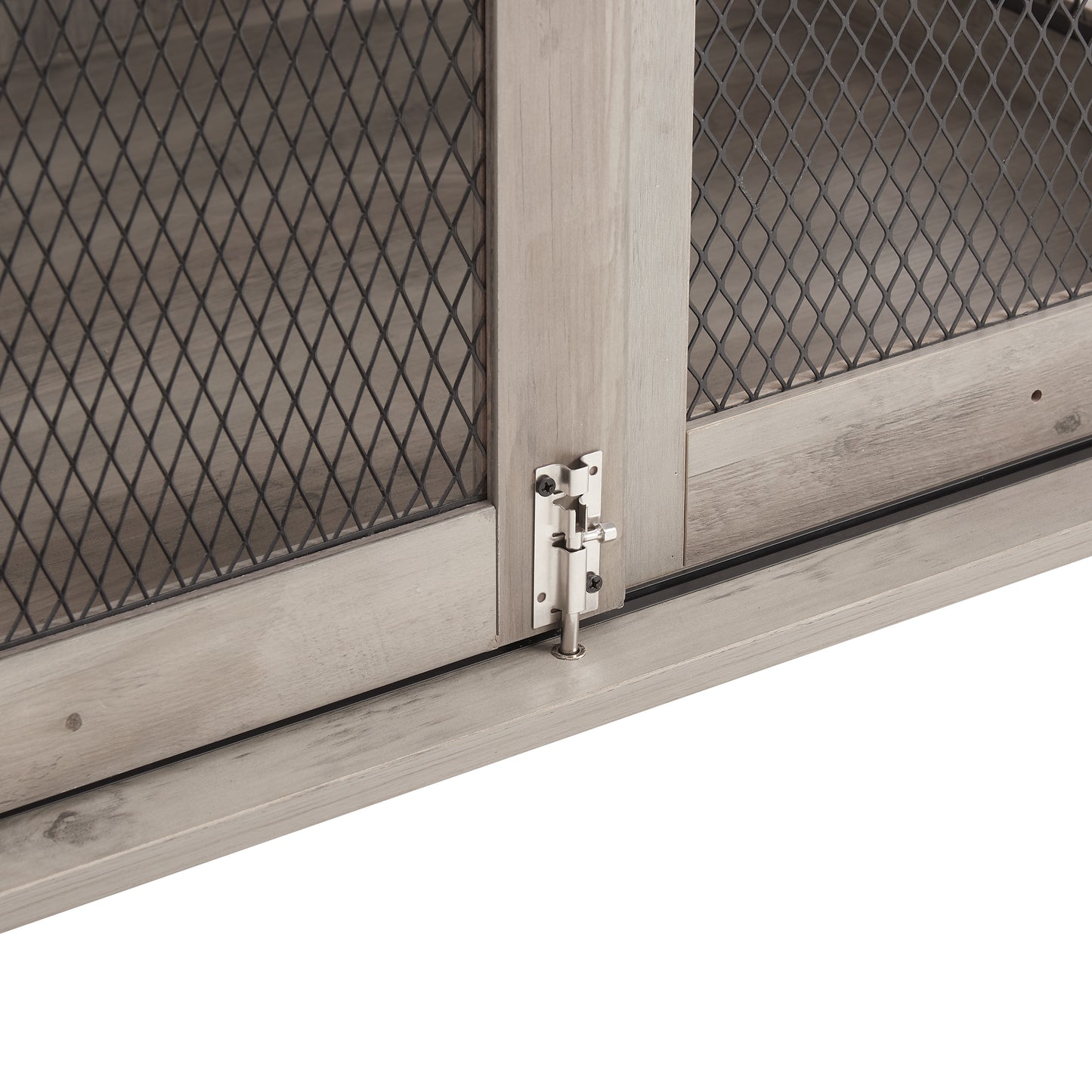 Rustic grey wood cabinet door with metal mesh inlay and bolt latch