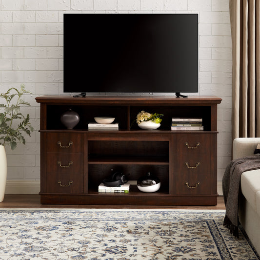 Dark wood TV stand with three drawers and open shelving featuring antique brass hardware