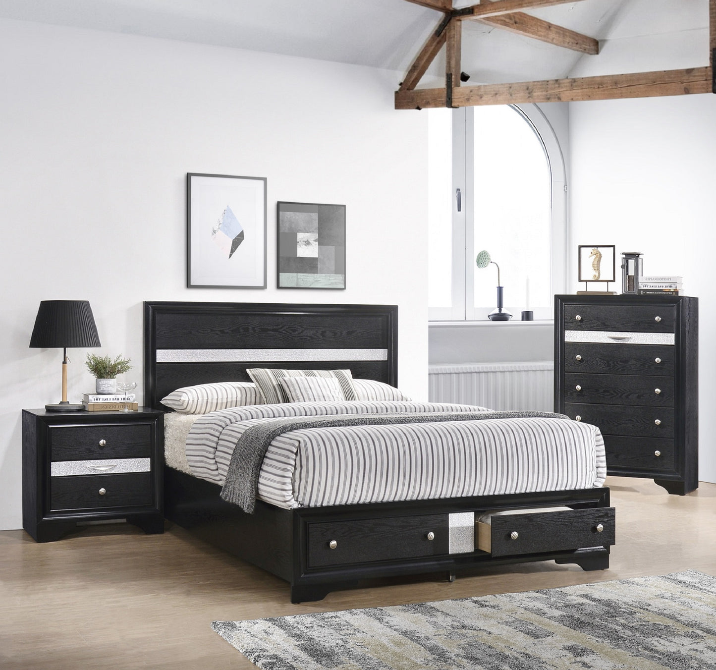 Black wood platform bed with storage drawers and silver trim detailing