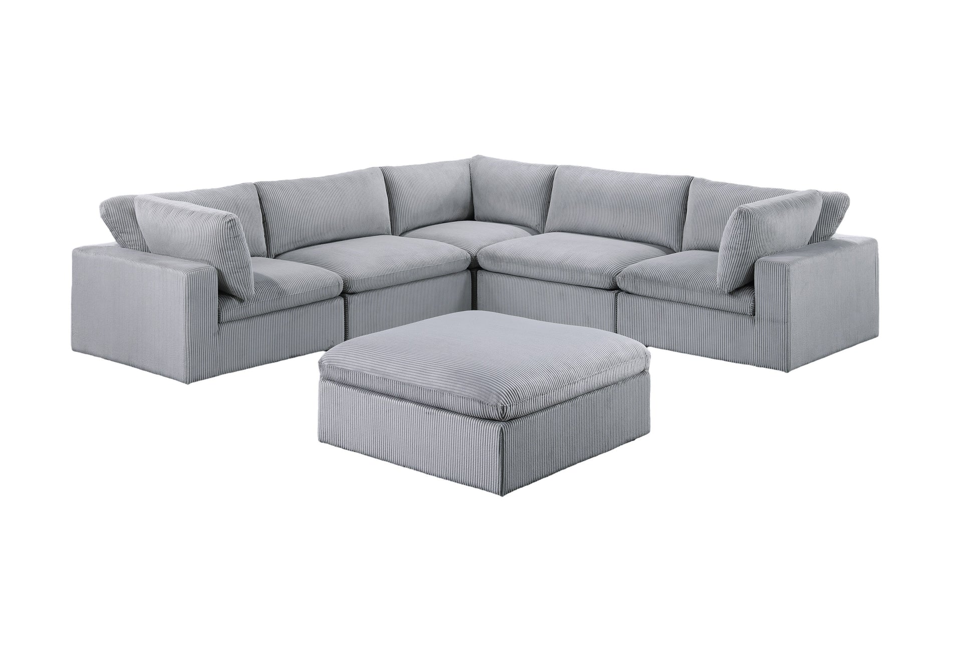 Sectional sofa in light gray corduroy fabric with plush cushions and matching ottoman