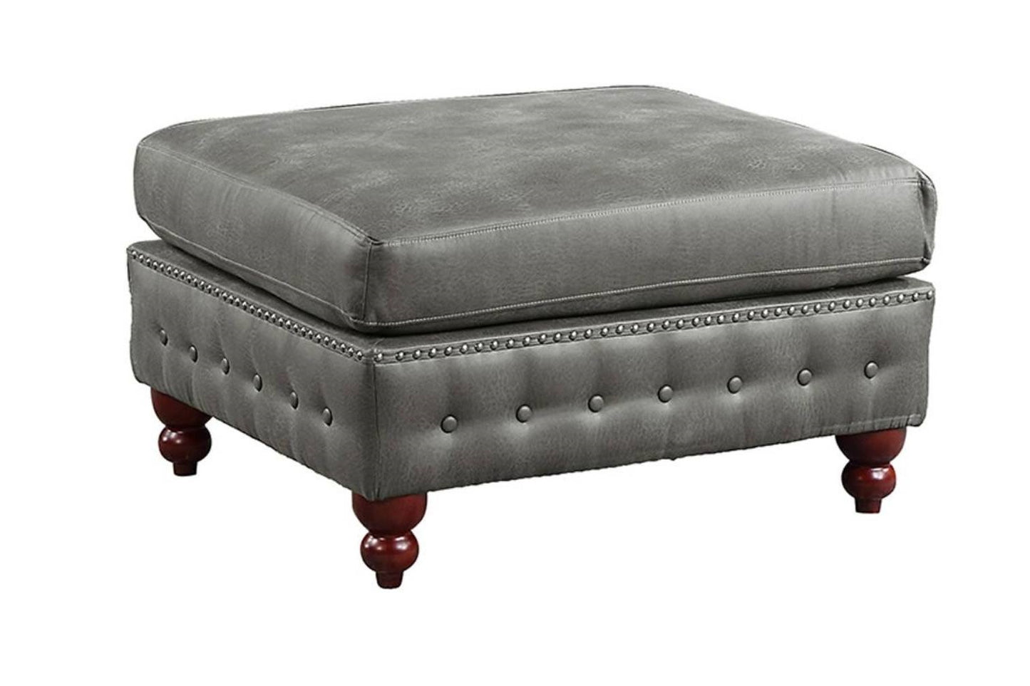 Square gray tufted leather ottoman with silver nailhead trim and dark wood legs
