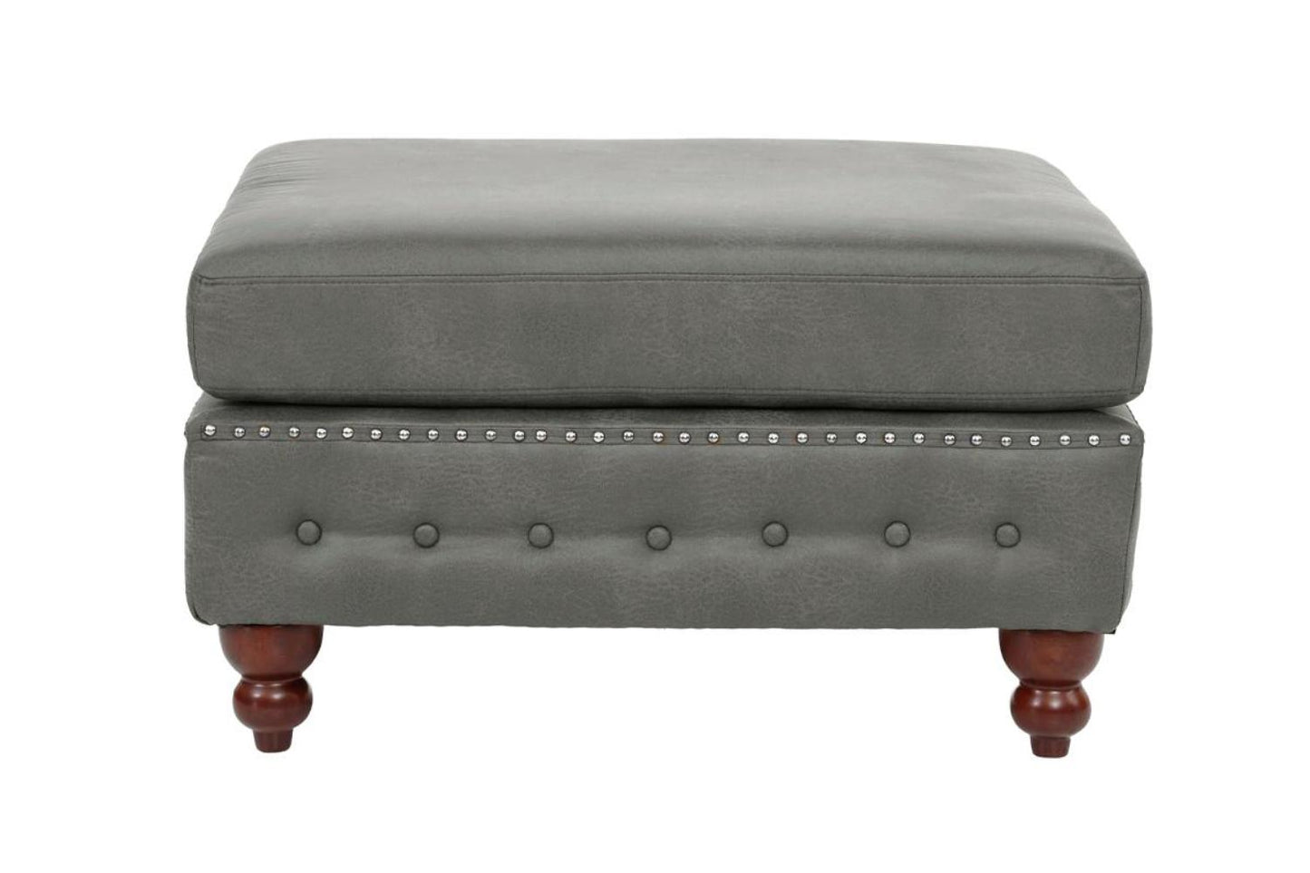 Gray faux leather ottoman with tufted details and decorative nailhead trim
