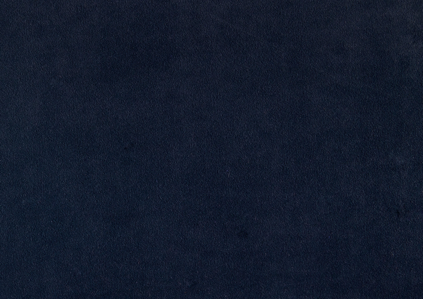 Closeup of textured navy blue fabric perfect for upholstery