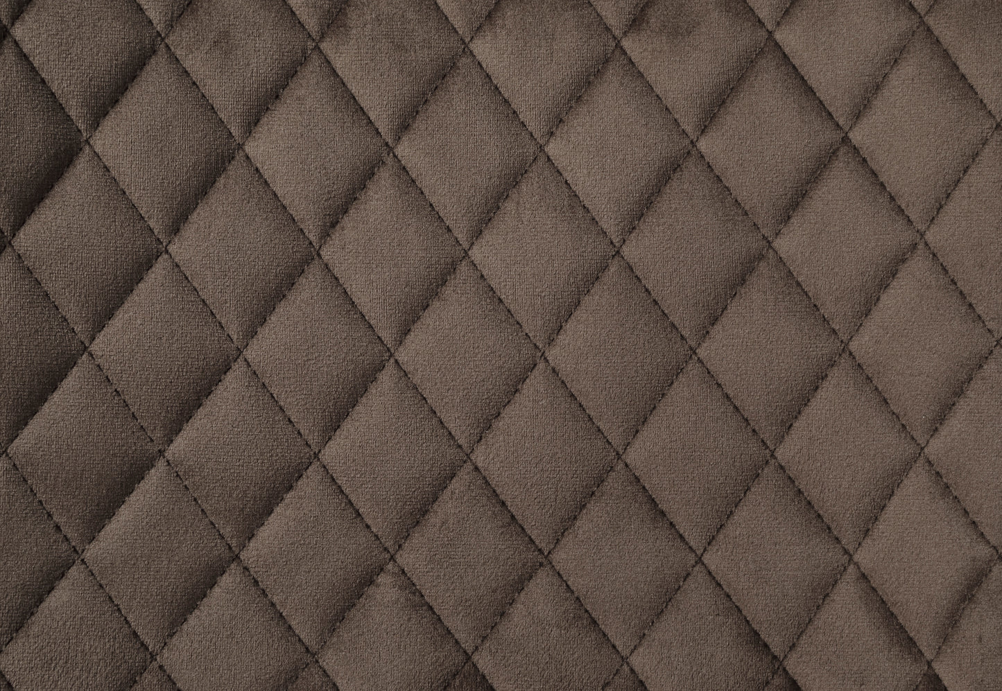Brown quilted fabric texture with diamond pattern ideal for upholstery