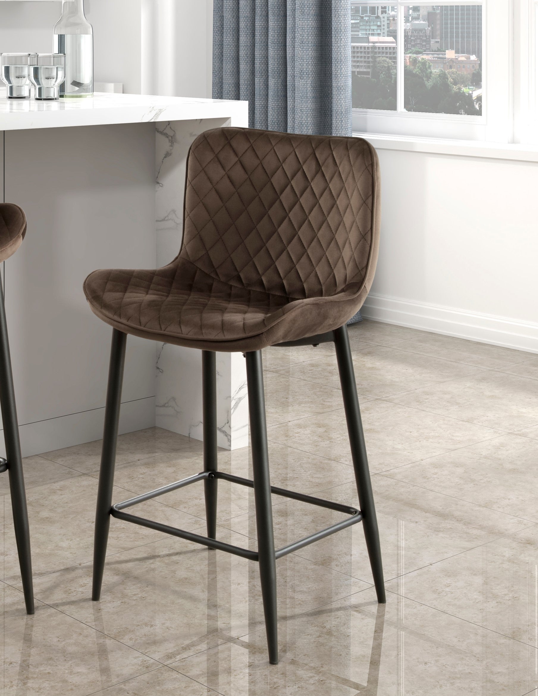 Quilted brown velvet bar stool with black metal legs and a diamondstitched backrest