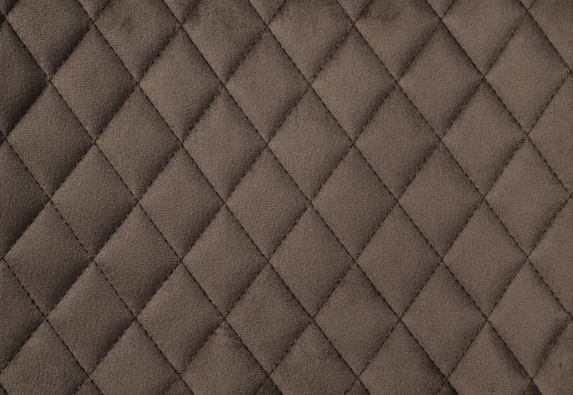 Brown quilted velvet fabric texture for upholstery