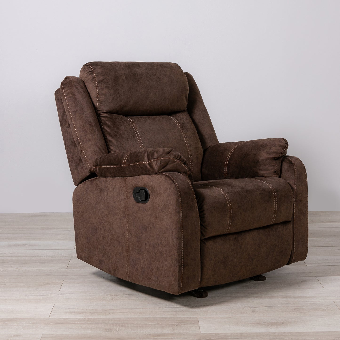 Plush brown fabric recliner chair with contrasting stitching and a side lever