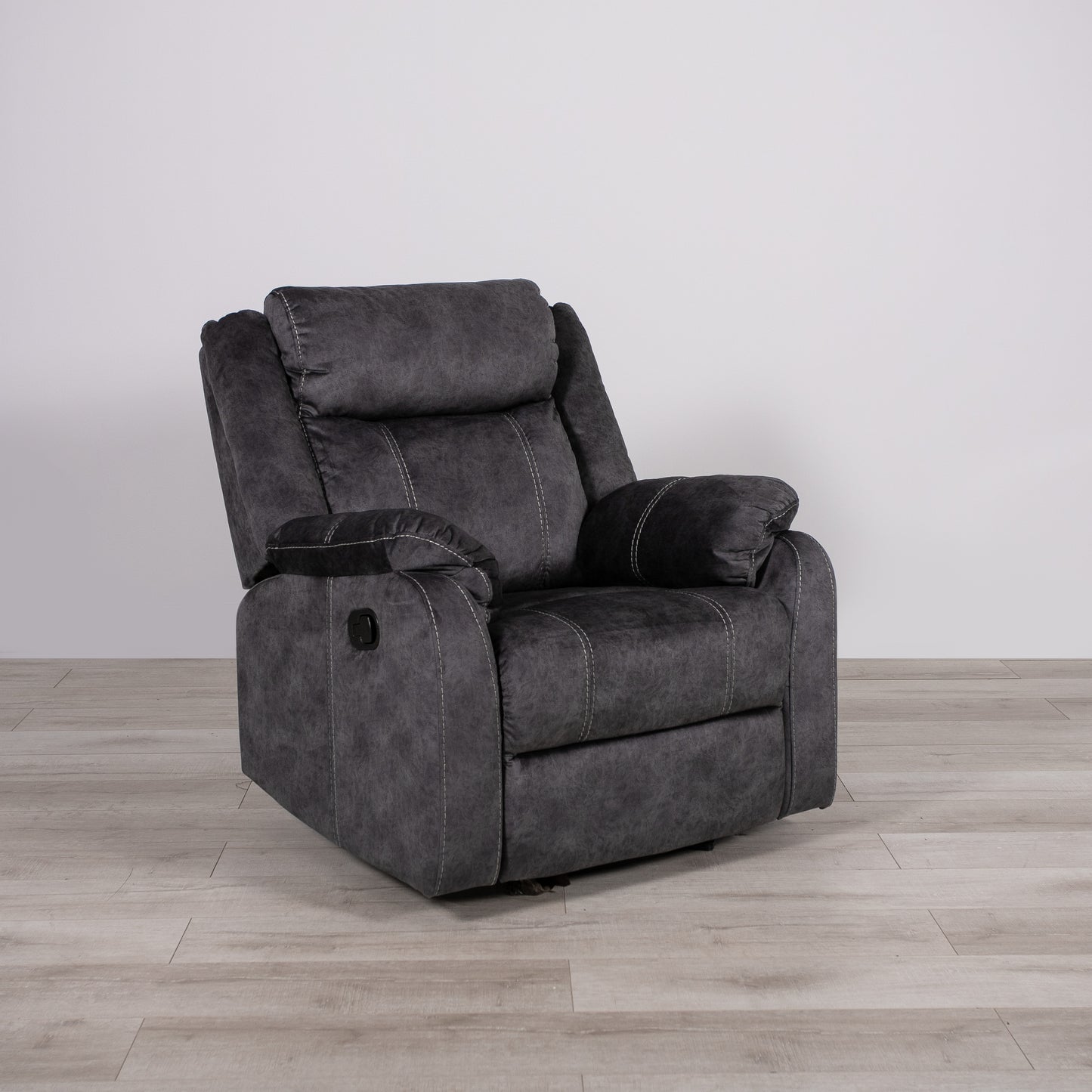 Dark gray fabric recliner chair with plush cushioning and contrasting white stitching for ultimate comfort and style